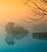 Misty river at dawn.